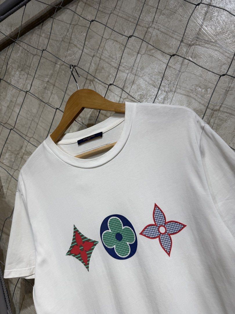 Louis Vuitton Monogram Graphic White Tee Size M (Category: Tshirts & Polo Shirts ) located in Manila. Submitted by ardobe.mnl (Listing ID 1464747910, Image 3). Description: Louis Vuitton White Tee. Size: Large Dimes: 21x28 Condition: Excellent Flaw: None! Dm for inquiries!.