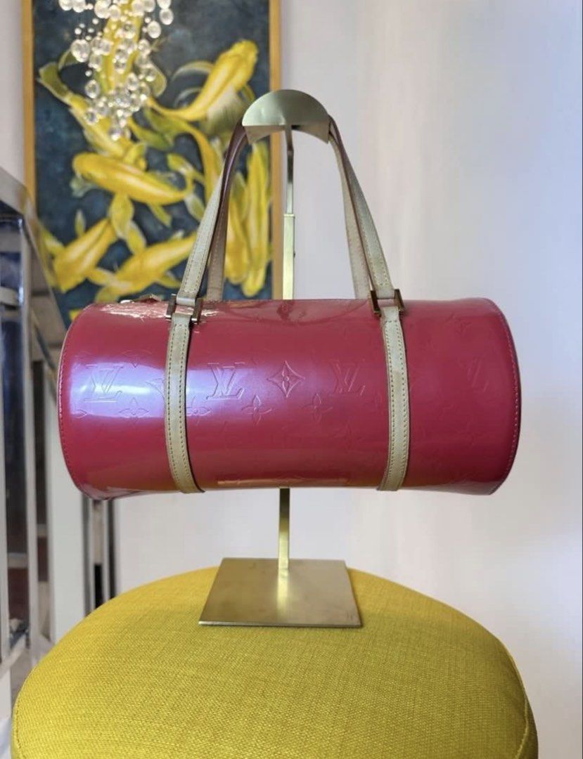 Louis Vuitton Monogram Vernis Papillon NEGOTIABLE (Category: Luxury Bags & Wallets) located in Makati City. Submitted by bcloset2 (Listing ID 1464748540, Image 1). Description: - Brand: Louis Vuitton - Model: Papillon - Material: Pink Monogram Vernis Leather with Vachetta Trim - Shape: Cylindrical with structured handles - Closure: Top zip closure - Interior: Spacious pink lining with exterior side pocket - Inclusions: Original beige Louis Vuitto