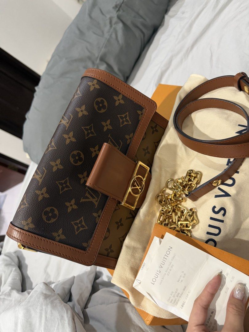 LOUIS VUITTON DAUPHINE MM (Category: Luxury Bags & Wallets) located in Manila. Submitted by prieenkles0819 (Listing ID 1464737942, Image 1). Description: - Brand: Louis Vuitton - Material: Monogram canvas with tan leather trim - Hardware: Gold-tone - Straps: Includes interchangeable leather shoulder strap and chunky chain strap - Condition: Pristine exterior and interior, very well-maintained - Inclusions: Original dust bag, box, paper bag and pu