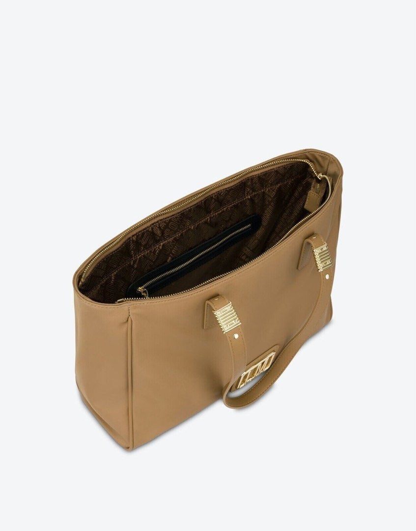 Love Moschino Tote Bag - Camel (Category: Tote Bags) located in Cebu City. Submitted by thelittlefindscbu (Listing ID 1464574218, Image 2). Description: LOVE MOSCHINO Borsa JC4294 Women’s Beige Nylon Shopper Bag (Hand & Shoulder Carry) - Authentic Love Moschino Tote Bag - Rectangular shape with a tan exterior - Double top handles with gold-tone hardware - Features the Love Moschino logo - Interior includes a zippered pocket and branded lining - C