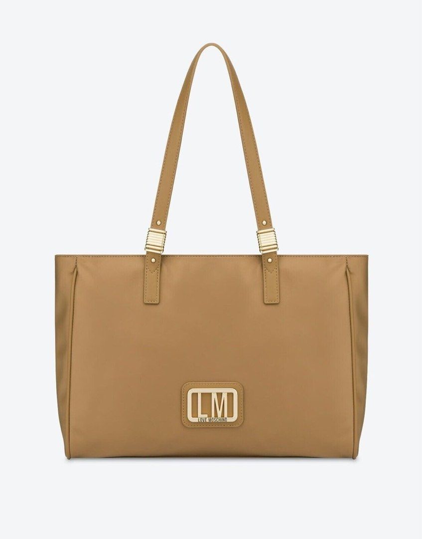 Love Moschino Tote Bag - Camel (Category: Tote Bags) located in Cebu City. Submitted by thelittlefindscbu (Listing ID 1464574218, Image 1). Description: LOVE MOSCHINO Borsa JC4294 Women’s Beige Nylon Shopper Bag (Hand & Shoulder Carry) - Authentic Love Moschino Tote Bag - Rectangular shape with a tan exterior - Double top handles with gold-tone hardware - Features the Love Moschino logo - Interior includes a zippered pocket and branded lining - C