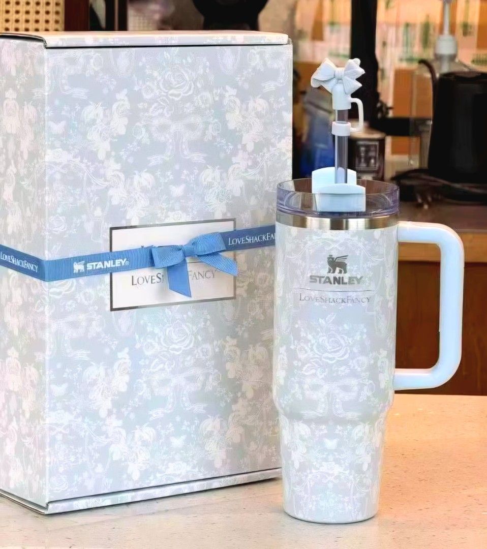 LOVESHACKFANCY QUENCER GIFT SET TUMBLER ELEGANT BLUE (Category: Water Bottles & Tumblers) located in Quezon City. Submitted by happy.cutie888 (Listing ID 1464748383, Image 3). Description: NEW Stanley x LoveShackFancy Quencher H2.0 FlowState Tumbler Gift Set Limited-edition Stanley x LoveShackFancy collaboration! This stunning 40 oz Quencher H2.0 FlowState Tumbler features a gorgeous, romantic white floral toile pattern over a dreamy pastel backg