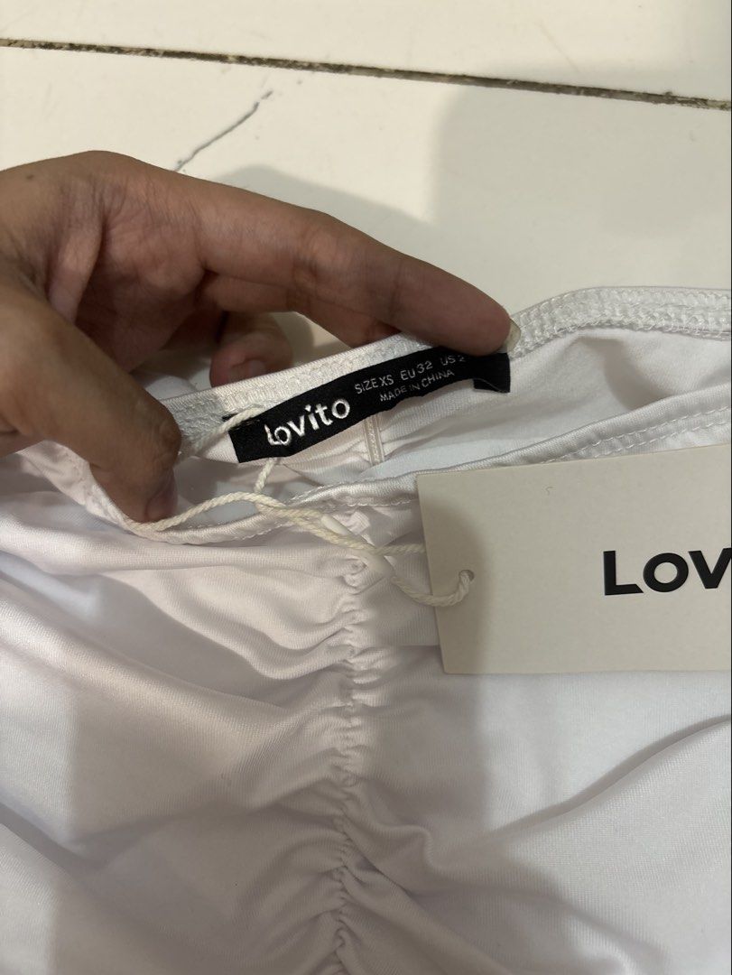 Lovito White Skirt (Category: Skirts) located in Quezon City. Submitted by den.declutters (Listing ID 1464623434, Image 2). Description: .
