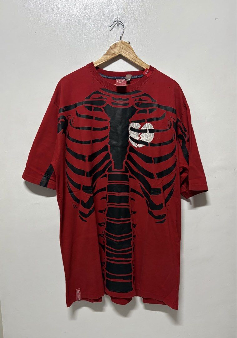LRG Red Skeleton Ribcage Graphic Tee Shirt (Category: Tshirts & Polo Shirts ) located in Manila. Submitted by skeletal_v2 (Listing ID 1464743921, Image 1). Description: LRG- SKELETON RED VINTAGE Y2K 25/33 GOOD CONDITION COLOR RATE 9/10 ISSUE PIC MULTI PINHOLE - Brand: LRG - Size: Large - Color: Red with black and white graphics - Design: Large skeletal ribcage graphic on front/sleeves and white broken heart text fill on the chest - Details: Crew 