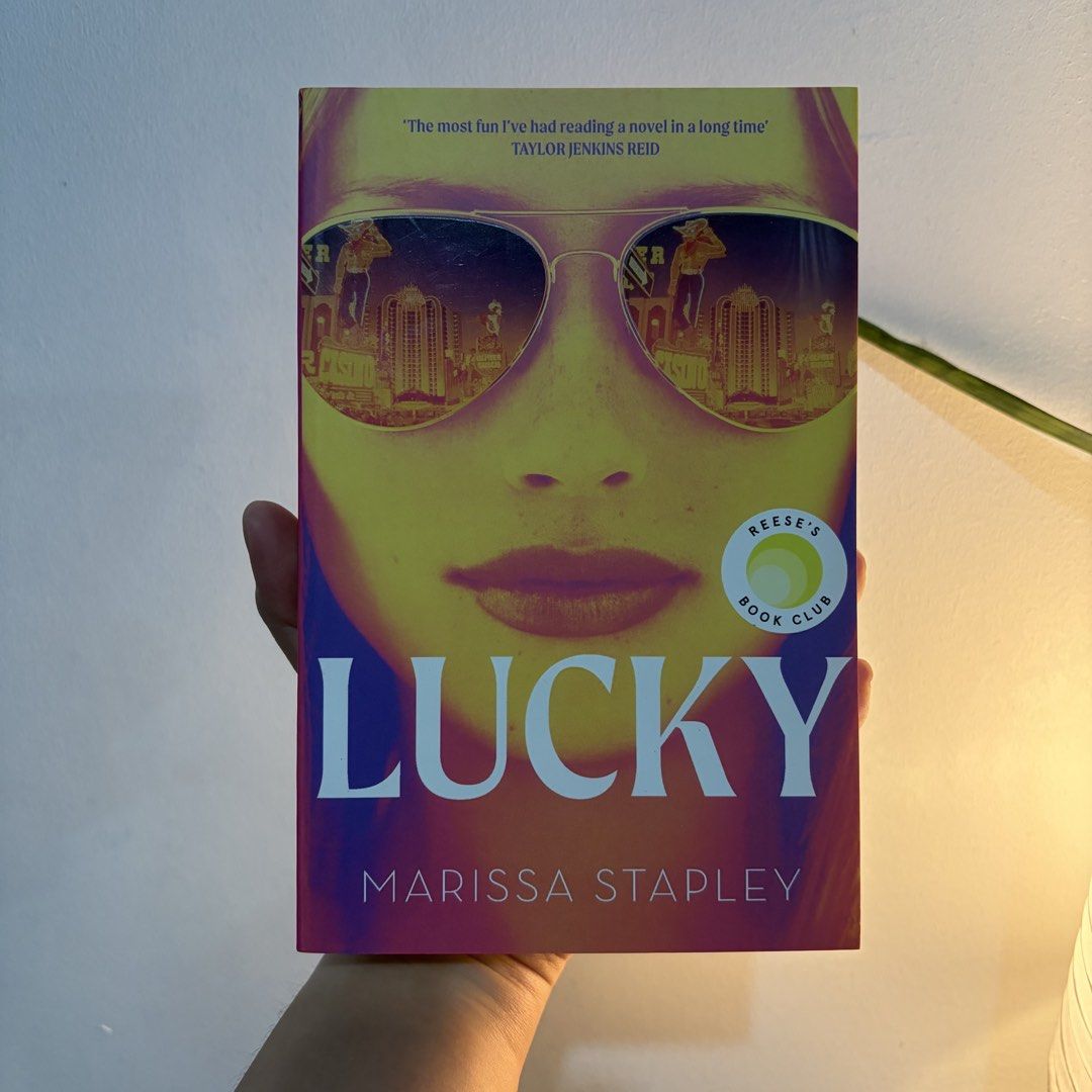 Lucky by Marissa Stapley (Category: Storybooks) located in Manila. Submitted by ajdeclutter (Listing ID 1464716925, Image 1). Description: - Title: Lucky by Marissa Stapley (Paperback) - Feature: Official Reese's Book Club pick - Genre: Gripping thriller about a heist and a winning lottery ticket that can't be cashed.