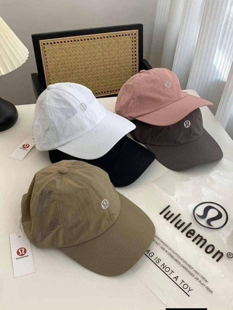 Lululemon, Alo, Prada, On Running Baseball Caps (Category: Caps & Hats) located in Santo Domingo. Submitted by krizzies_korner (Listing ID 1464645374, Image 3). Description: - Variety of baseball caps available - Brands include Lululemon, Alo, Prada, and On Running - Colors: pink, white, black, grey, blue, beige, red, purple, and more - Some caps feature mesh panels - Ideal for everyday wear or sports activities.