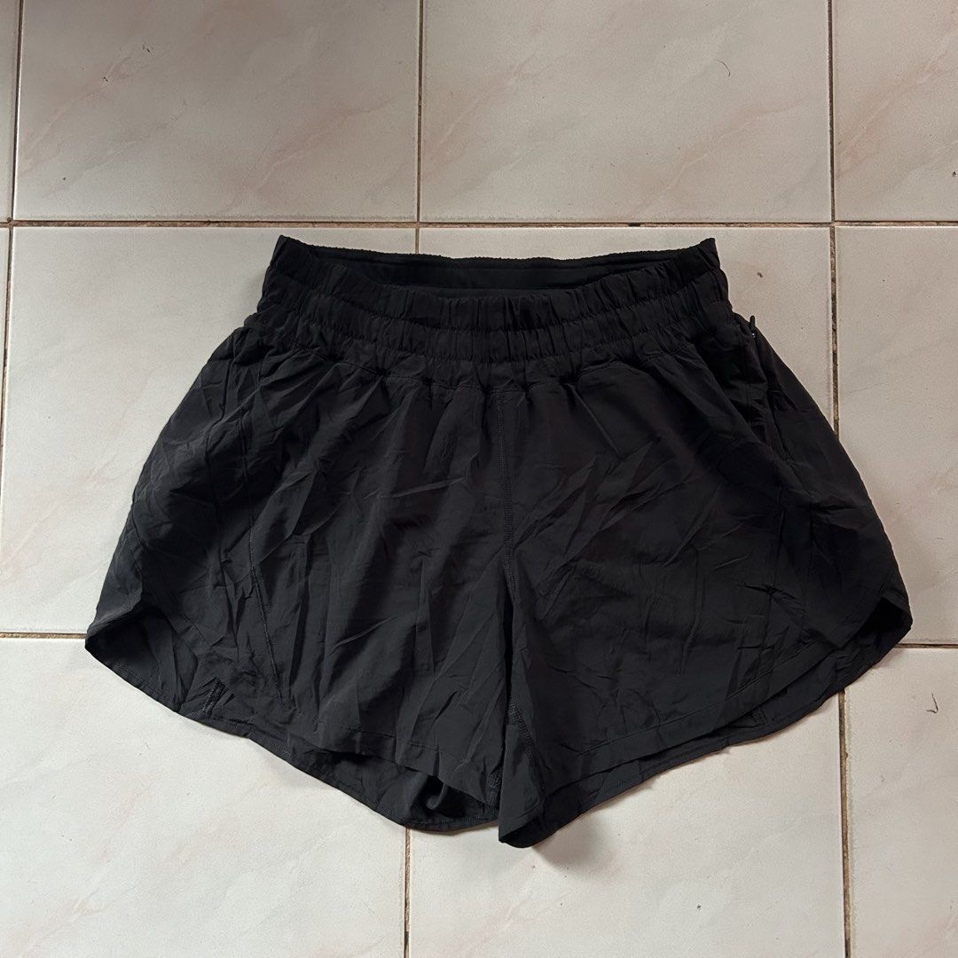 Lululemon Black Running Shorts Size 8 🥵 (Category: Shorts) located in Jinoba-an. Submitted by eegiboy (Listing ID 1464655511, Image 2). Description: - Lululemon black running shorts - Elastic waistband for a comfortable fit - Convenient small zipper pocket at the back - Iconic Lululemon logo on the left leg and zipper pull - Versatile for workouts, running, or everyday casual wear Dot 8 Dimes: 28-32 stretch L-13 Excellent condi 600plussf DM ME I