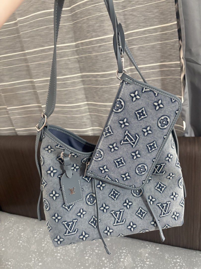 Lv denim carryall with pouch (Category: Shoulder Bags) located in Manila. Submitted by cappadociadream (Listing ID 1464750088, Image 1). Description: With magnetic box.