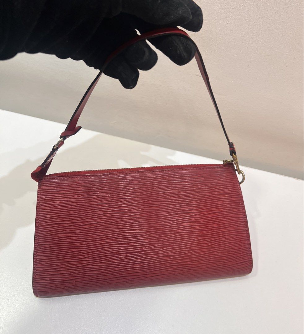 LV Epi Leather Pochette Accessoires (Category: Luxury Bags & Wallets) located in Cebu City. Submitted by brandedcorner_ph (Listing ID 1464728817, Image 2). Description: Pre-loved ((L))((V)) Epi Leather Pochette Accessoires 100% Authentic or money back The item was authenticated verbally by Dr. Runway. Condition • Excellent condition • No flaws • Minor signs of wear only Product Details •Color: Red •Hardware: Gold tone •Material: Leather •Approxim