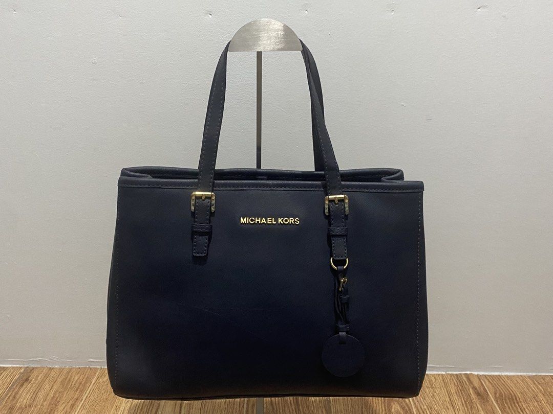 M ⁠♡⁠ K Leather Tote (Category: Tote Bags) located in Davao. Submitted by ccfinds_ph (Listing ID 1464681284, Image 1). Description: Jet Set Tote * Condition: Fair / well-loved ( has front diagonal scratch and crease) ♡ TERMS & REMINDERS ♡ -｡˚✿ Item is preloved; please manage expectations as I’m not an expert. -｡˚✿ As this is a used item with visible wear, please refrain from buying if you are overly concerned about its condition. For layaway: -｡˚