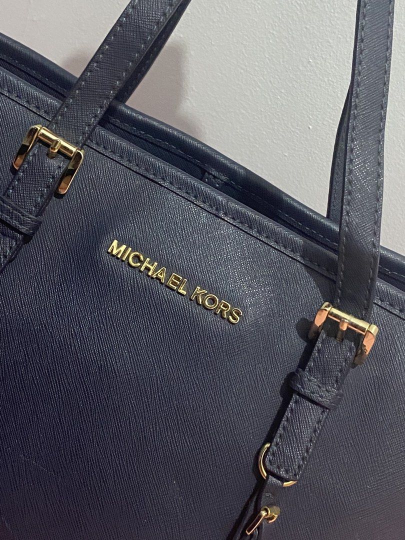 M ⁠♡⁠ K Leather Tote (Category: Tote Bags) located in Davao. Submitted by ccfinds_ph (Listing ID 1464681284, Image 3). Description: Jet Set Tote * Condition: Fair / well-loved ( has front diagonal scratch and crease) ♡ TERMS & REMINDERS ♡ -｡˚✿ Item is preloved; please manage expectations as I’m not an expert. -｡˚✿ As this is a used item with visible wear, please refrain from buying if you are overly concerned about its condition. For layaway: -｡˚