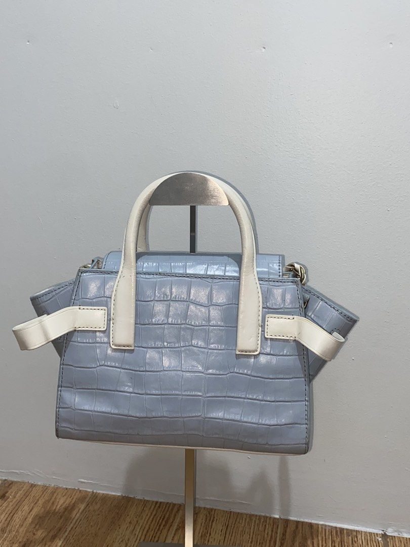 M ⁠♡⁠ K Light Blue Satchel with Chain Strap (Category: Luxury Bags & Wallets) located in Davao. Submitted by ccfinds_ph (Listing ID 1464680265, Image 2). Description: * Condition: Well-loved with visible scuffing and discoloration on handles/corners .