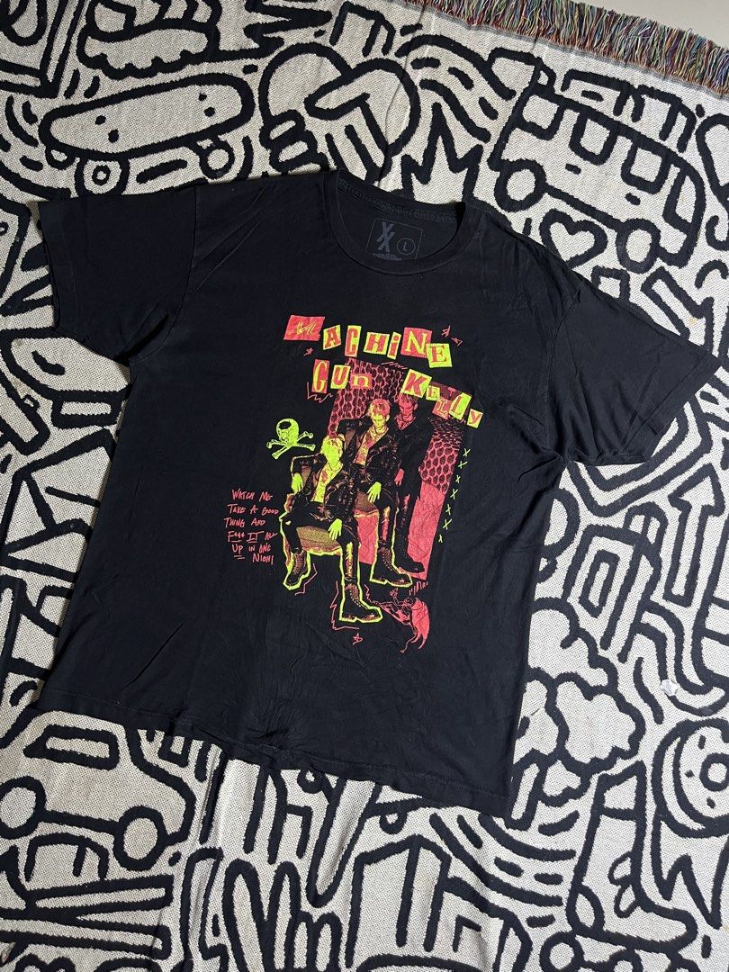 Machine Gun Kelly Black Graphic Tee Size L (Category: Tshirts & Polo Shirts ) located in Silang. Submitted by yusthrift (Listing ID 1464722226, Image 1). Description: - Item: Machine Gun Kelly Graphic T-Shirt - Color: Black - Size: Large (tag printed inside collar) - Design: Front graphic with lyric text print ("Watch Me Take A Good Thing And F*** It All Up In One Night"), clean blank back - Fit: Standard crew neck - Material: 100% Cotton 22 inch