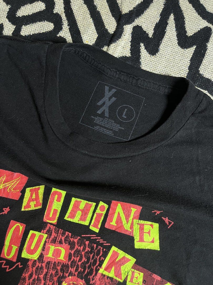 Machine Gun Kelly Black Graphic Tee Size L (Category: Tshirts & Polo Shirts ) located in Silang. Submitted by yusthrift (Listing ID 1464722226, Image 3). Description: - Item: Machine Gun Kelly Graphic T-Shirt - Color: Black - Size: Large (tag printed inside collar) - Design: Front graphic with lyric text print ("Watch Me Take A Good Thing And F*** It All Up In One Night"), clean blank back - Fit: Standard crew neck - Material: 100% Cotton 22 inch