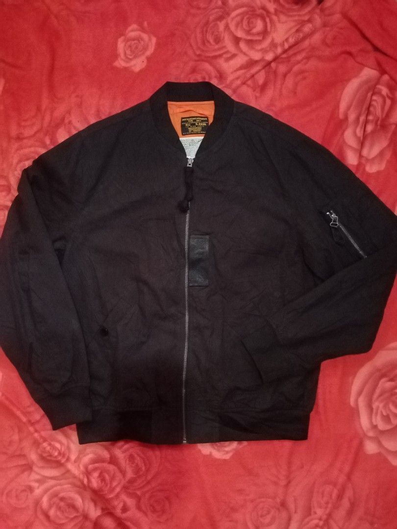 Maden MA-1 Flying Man's Intermediate Bomber Jacket (Category: Coats, Jackets and Outerwear) located in Danao, Cebu. Submitted by althethrifter (Listing ID 1464693624, Image 1). Description: - Brand/Model: Maden MA-1 Flight Jacket - Color: Classic black with high-visibility bright orange lining - Hardware: Heavy-duty front zipper closure and left sleeve utility pocket - Details: MIL-J-8279 interior specification label and military-inspired inner b