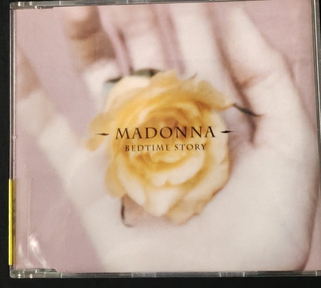 Madonna Bedtime Story CD Album (Category: CDs & DVDs) located in Manila. Submitted by ruelcabrer77078 (Listing ID 1464749088, Image 1). Description: - Artist & Title: Madonna - Bedtime Story (Maxi-CD Single) - Origin: Made in Germany - Packaging: Jewel case with front inlay showing a hand holding a yellow rose - Tracklist includes: Album Edit, Junior's Wet Dream Mix, Junior's Dreamy Drum Dub, Orbital Mix, and Junior's Sound Factory Mix - Conditio