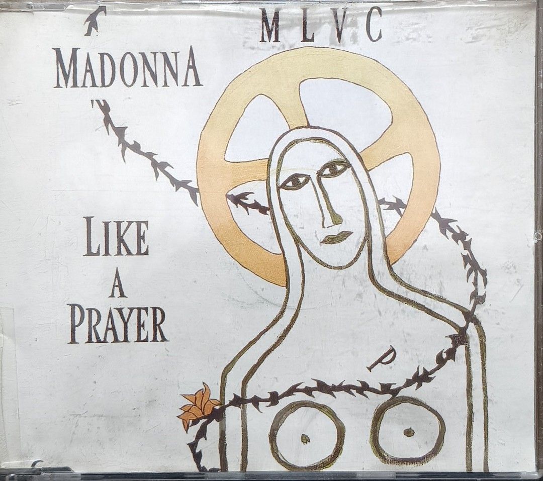 Madonna Like A Prayer CD Maxi-Single (Category: CDs & DVDs) located in Manila. Submitted by ruelcabrer77078 (Listing ID 1464747584, Image 1). Description: Madonna Like A Prayer CD maxi-single released by Sire Records in 1989. Made in Germany. Includes 12-inch extended remix, 12-inch club version, act of contrition, and 7-inch remix/edit. Jewel case packaging with yellow disc featuring track listing and catalogue numbers 7599 21189-2 and WE 739. H