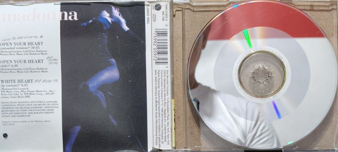 Madonna Open Your Heart CD Single (Category: CDs & DVDs) located in Manila. Submitted by ruelcabrer77078 (Listing ID 1464747458, Image 2). Description: Madonna Open Your Heart maxi single CD released by Sire Records in 1986. Made in Germany. Tracklist includes extended version, dub version, and LP version of White Heart. Jewel case and disc included. Discs have handwritten markings M64 and RPC..