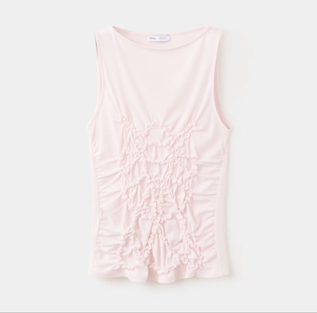 Mango Pink Ruched Sleeveless Tank Top (Category: Sleeveless) located in Baguio. Submitted by pinkynj (Listing ID 1464606676, Image 1). Description: - Cute pink Mango tank top - Unique ruched detail on the front - Sleeveless design, ideal for hot weather - Versatile: pairs well with jeans or white pants - Comfortable and stylish - Original Price: 1695.