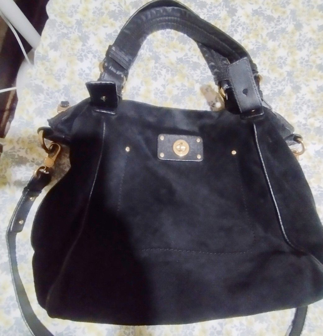 Marc by Marc Jacobs Black Suede Shoulder Bag (Category: Cross-body Bags) located in Manila. Submitted by lene48 (Listing ID 1464597477, Image 1). Description: - Authentic Marc by Marc Jacobs black suede shoulder bag - Elegant gold hardware details - Interior lining features the signature Marc Jacobs logo print - Made in Indonesia - Comes with a detachable shoulder strap for versatile styling - Ample space to carry all your daily essentials.