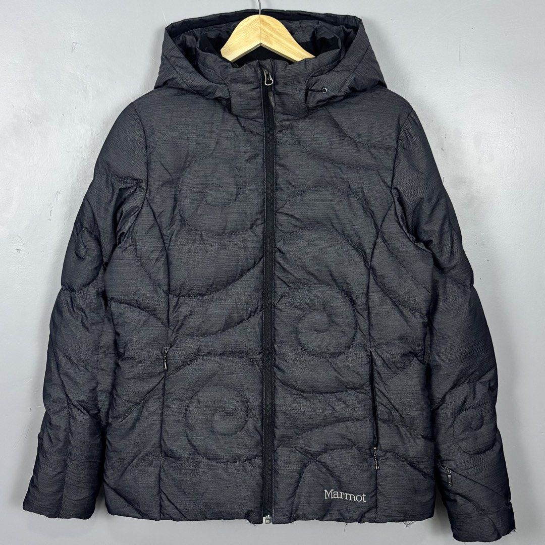 Marmot Down Puffer Jacket with Hood (Category: Coats, Jackets and Outerwear) located in Mabalacat. Submitted by doughnutthrift (Listing ID 1464661441, Image 1). Description: MARMOT PUFFER JACKET Excellent condition W- 21” L- 26” No issues.