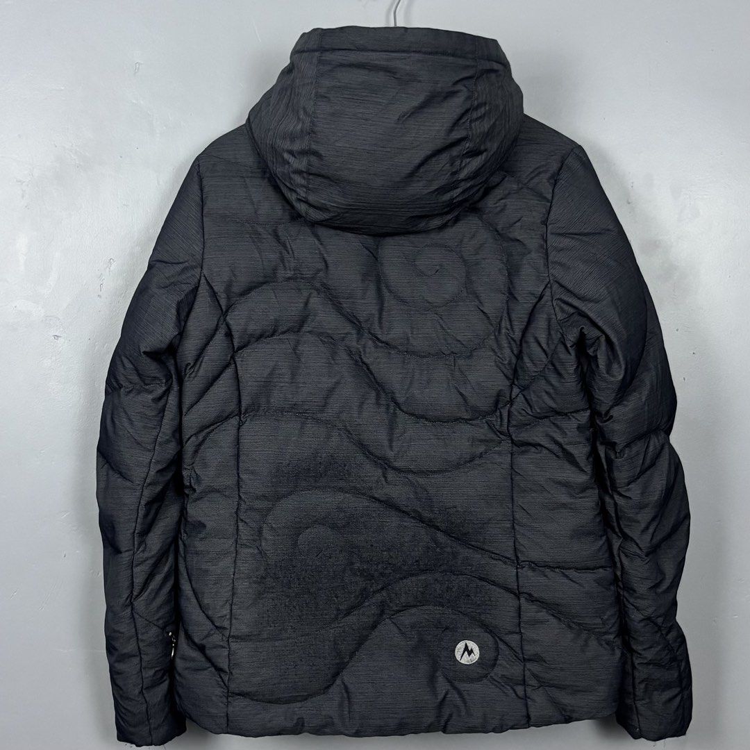 Marmot Down Puffer Jacket with Hood (Category: Coats, Jackets and Outerwear) located in Mabalacat. Submitted by doughnutthrift (Listing ID 1464661441, Image 3). Description: MARMOT PUFFER JACKET Excellent condition W- 21” L- 26” No issues.