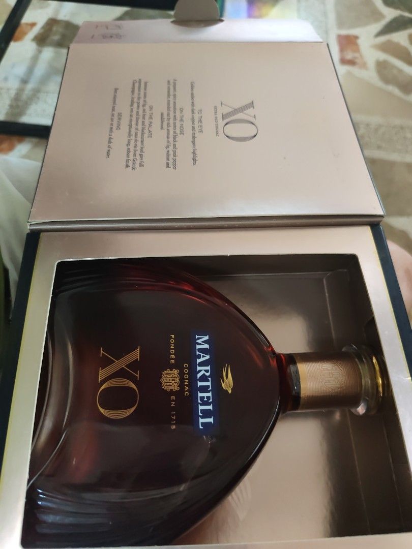 Martell XO Extra Old Cognac (Category: Beverages) located in Cavite. Submitted by payaso1317 (Listing ID 1464595307, Image 3). Description: - Martell XO Cognac - Extra Old (XO) designation - Founded in 1715 - Includes original box - Ideal for collectors or as a special gift.