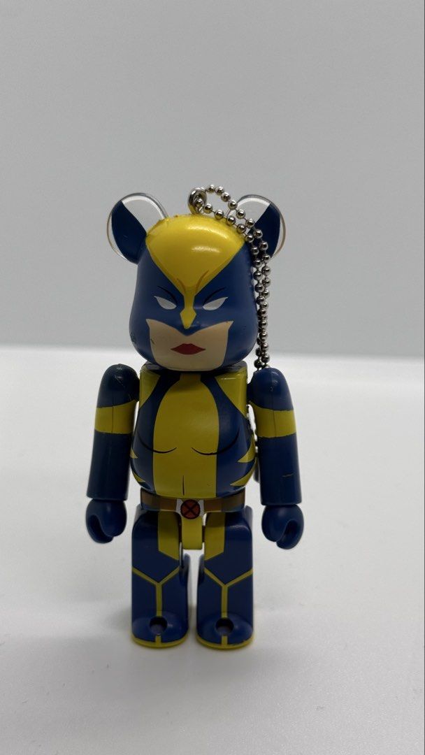 Marvel Wolverine Bearbrick Keychain Figure (Category: Designer & Blind Box Toys) located in Baguio. Submitted by zeemoda01 (Listing ID 1464712074, Image 1). Description: - Marvel Wolverine Bearbrick keychain - Iconic blue and yellow costume design with X-Men belt buckle - Detailed facial mask and painted red lips - Equipped with a ball chain at the ear for bags or keys - Features official Marvel copyright stamp on the back leg - Perfect collectib