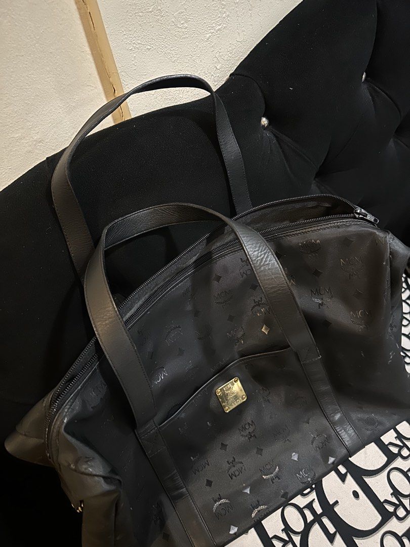 MCM Travel bag 45CM (Category: Tote Bags) located in Batangas. Submitted by stopandshopforluxury (Listing ID 1464650776, Image 2). Description: Guaranteed Original 💯 No flaws, can send more photos upon request. What you see is what you get. Shipping via Lalamove, J&T, and LBC Disclaimer: This is a preloved bag. Actual condition is shown in photos. Expect normal signs of wear. Colors may slightly vary due to lighting. Please check all photos and 