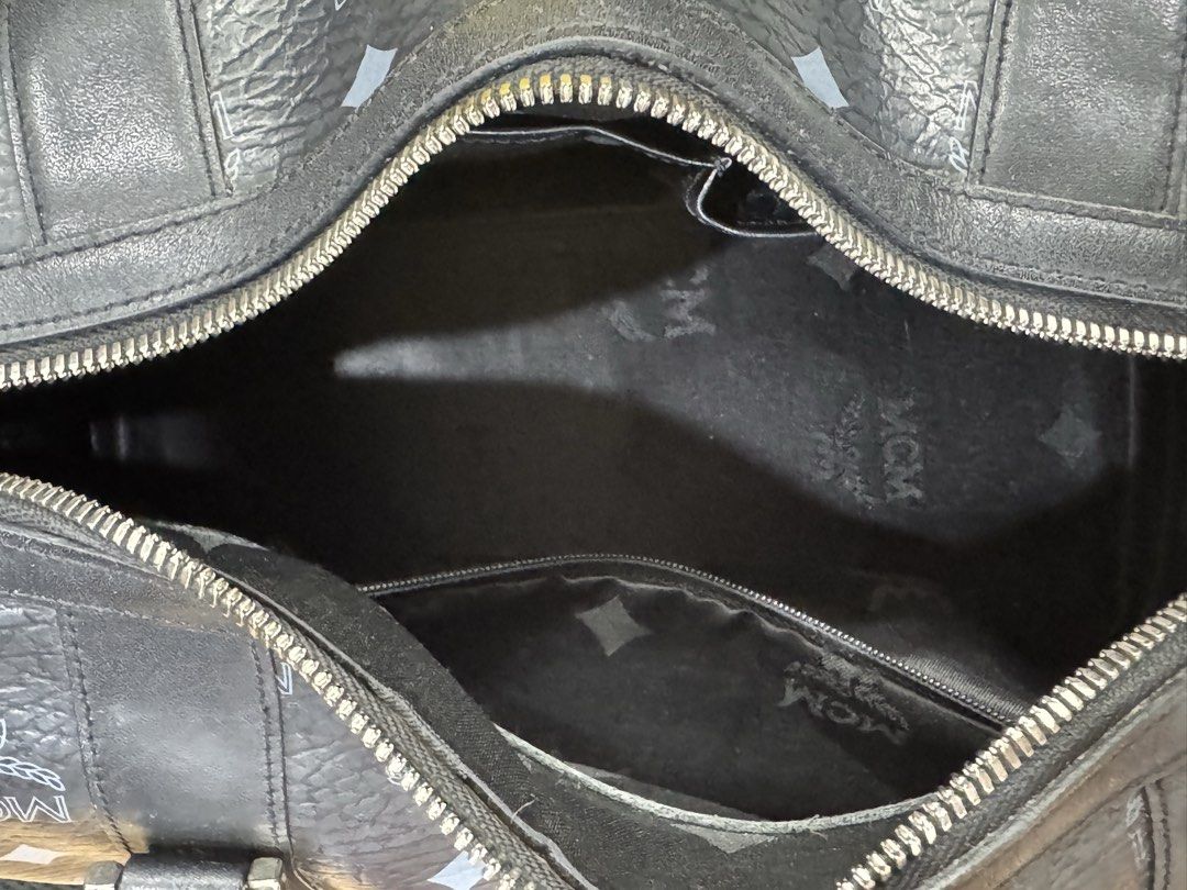 MCM Visetos Boston Bag Black (Category: Luxury Bags & Wallets) located in Manila. Submitted by tessfindsph (Listing ID 1464671988, Image 3). Description: - Authentic MCM Visetos Boston Bag - Color: Black - Classic MCM monogram print - Zipper closure with branded pull - Interior zippered pocket - Sturdy handles - Ideal for travel or everyday use - Price: ₱5,000.00 - will send code for interested buyers - used but not abused .