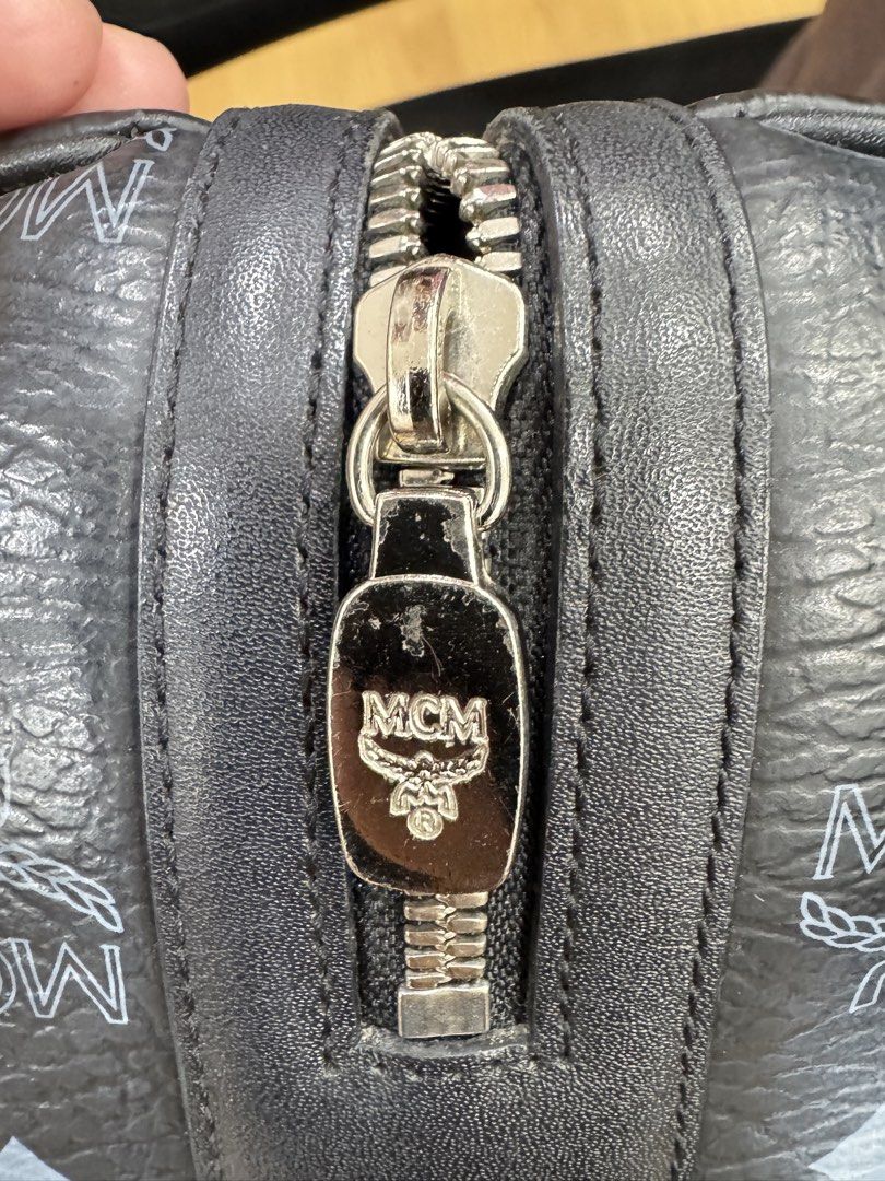 MCM Visetos Boston Bag Black (Category: Luxury Bags & Wallets) located in Manila. Submitted by tessfindsph (Listing ID 1464671988, Image 2). Description: - Authentic MCM Visetos Boston Bag - Color: Black - Classic MCM monogram print - Zipper closure with branded pull - Interior zippered pocket - Sturdy handles - Ideal for travel or everyday use - Price: ₱5,000.00 - will send code for interested buyers - used but not abused .
