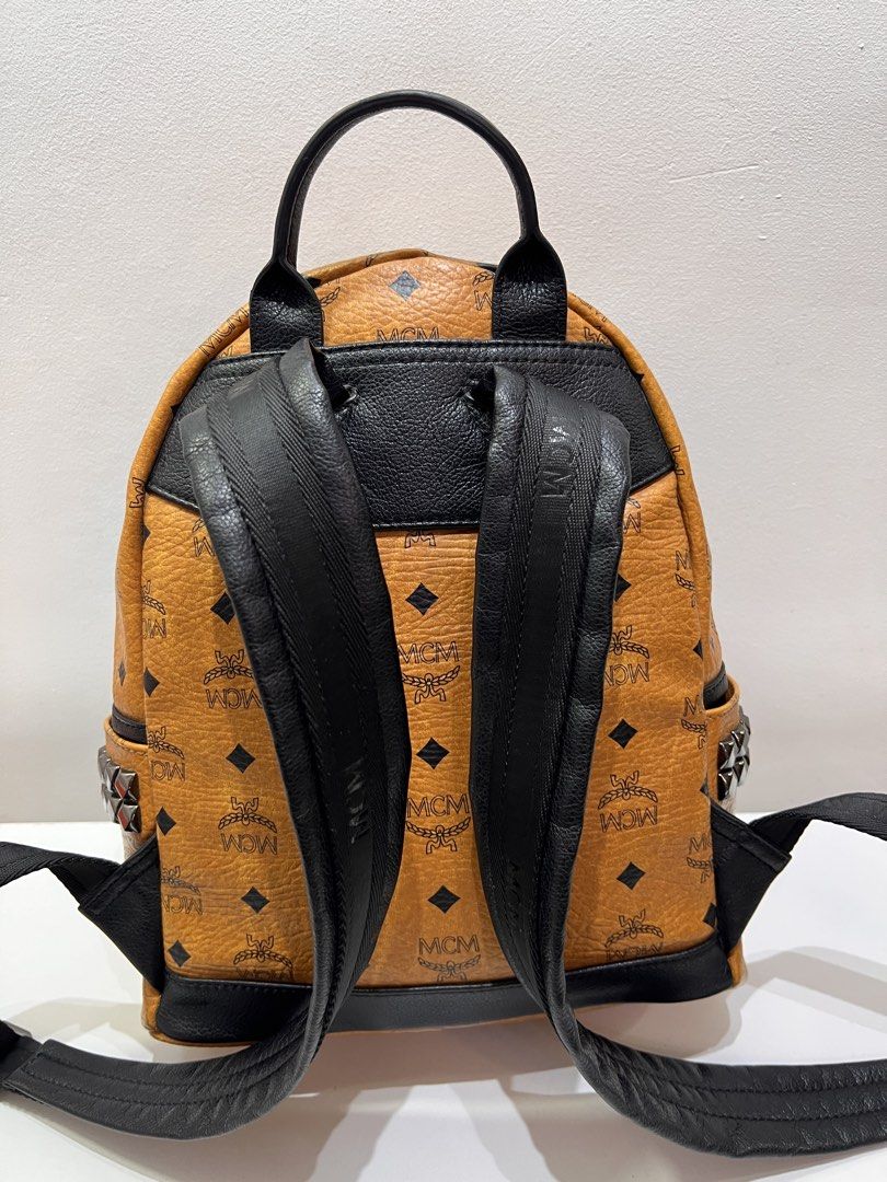 MCM Visetos Stark Cognac Small Backpack (Category: Luxury Bags & Wallets) located in Cebu City. Submitted by brandedcorner_ph (Listing ID 1464723882, Image 2). Description: Pre-loved (M)(C)(M) Visetos Stark Cognac Small Backpack 100% Authentic or money back Condition • Excellent condition • No flaws Product Details •Color: Brown & black •Hardware: Silver tone •Material: Leather •Approximate Dimensions in inches: H12.5 x W10.5 x D5 Color may vary 