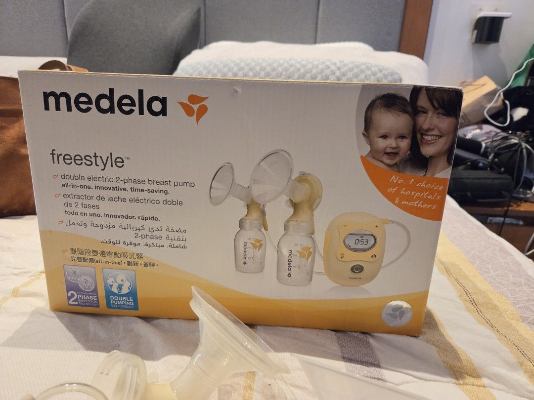 Medela Freestyle Double Electric Breast Pump Set (Category: Breastfeeding & Bottle Feeding) located in Taytay. Submitted by boymomof3 (Listing ID 1464766195, Image 1). Description: - Complete Medela Freestyle double electric breast pump set (hospital grade) - Includes main pump unit with digital screen and power adapter - Comes with tubing, breast shields, and 4 collection/storage bottles with stands and lids - Includes branded cooler bag with ic