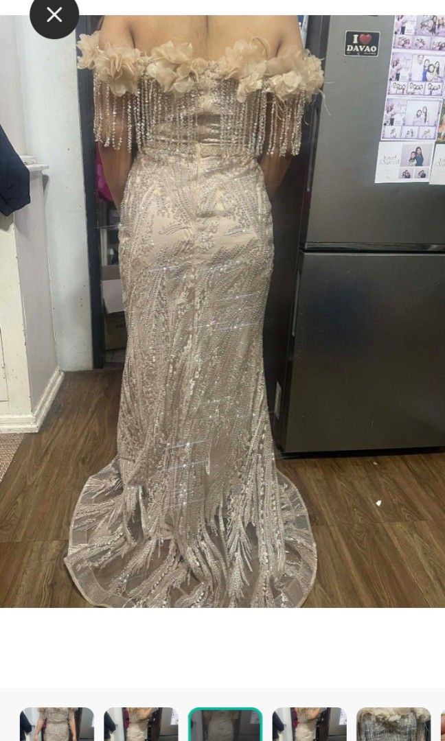 Mermaid gown (Category: Evening dresses & gowns) located in Quezon City. Submitted by Mayas_Warehouse (Listing ID 1464587535, Image 1). Description: mermaid silhouette — it fits closely from the bust down to the hips, then flares out at the bottom, creating a dramatic and flattering shape. The look is very bridal-inspired or gala-ready, perfect for weddings, proms, or formal events. Off-shoulder design that highlights the collarbone and shoulders