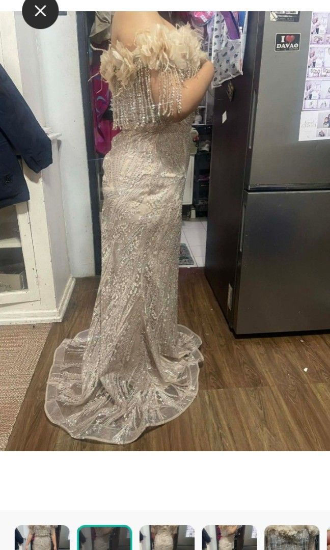 Mermaid gown (Category: Evening dresses & gowns) located in Quezon City. Submitted by Mayas_Warehouse (Listing ID 1464587535, Image 3). Description: mermaid silhouette — it fits closely from the bust down to the hips, then flares out at the bottom, creating a dramatic and flattering shape. The look is very bridal-inspired or gala-ready, perfect for weddings, proms, or formal events. Off-shoulder design that highlights the collarbone and shoulders