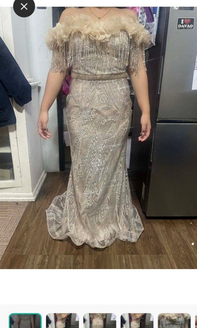 Mermaid gown (Category: Evening dresses & gowns) located in Quezon City. Submitted by Mayas_Warehouse (Listing ID 1464587535, Image 2). Description: mermaid silhouette — it fits closely from the bust down to the hips, then flares out at the bottom, creating a dramatic and flattering shape. The look is very bridal-inspired or gala-ready, perfect for weddings, proms, or formal events. Off-shoulder design that highlights the collarbone and shoulders