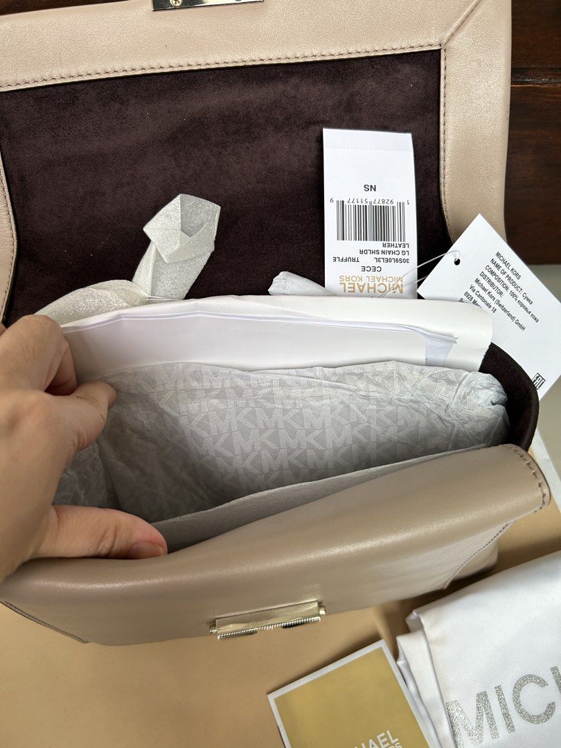 MICHAEL KORS CECE IN TRUFFLE (W/ RECEIPT!) (Category: Shoulder Bags) located in Mandaluyong City. Submitted by MARA.AM (Listing ID 1464598339, Image 3). Description: Bought this in Netherlands COMPLETE WITH PAPERBAG, DUSTBAG, RECEIPT, CARD .