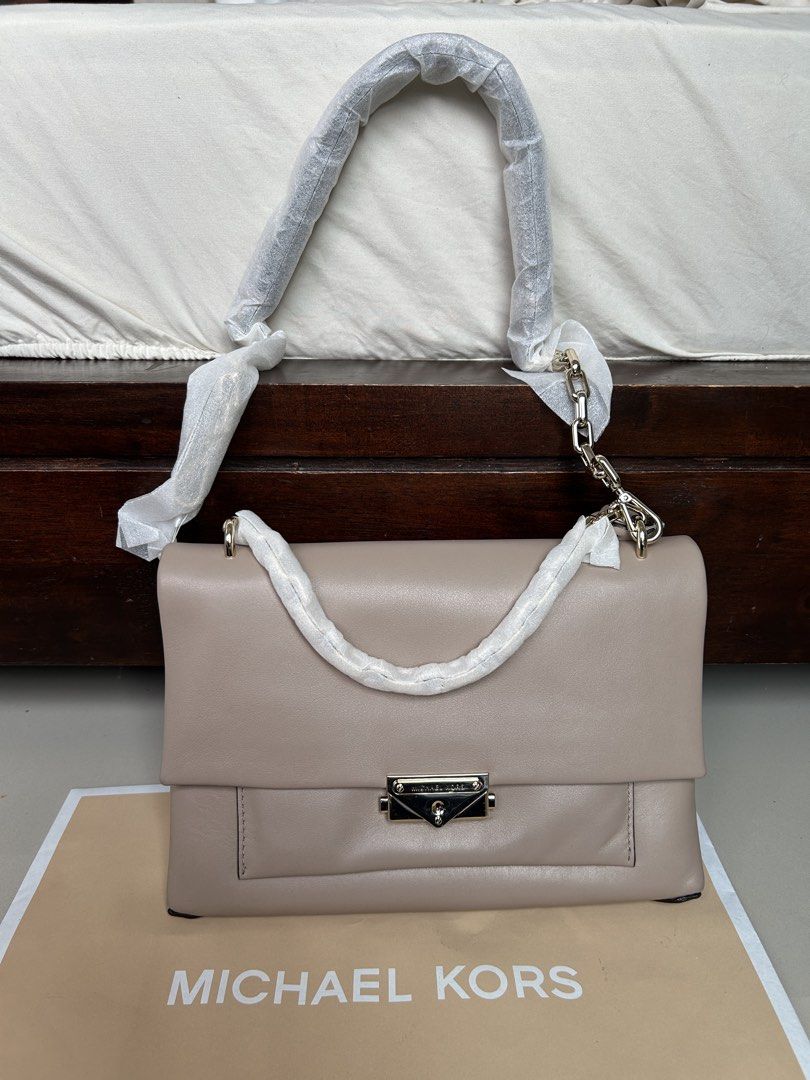 MICHAEL KORS CECE IN TRUFFLE (W/ RECEIPT!) (Category: Shoulder Bags) located in Mandaluyong City. Submitted by MARA.AM (Listing ID 1464598339, Image 1). Description: Bought this in Netherlands COMPLETE WITH PAPERBAG, DUSTBAG, RECEIPT, CARD .