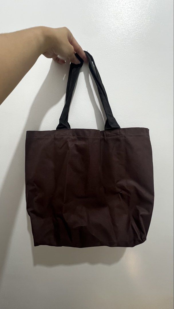 Miffy dark brown tote bag (Category: Tote Bags) located in Cavite. Submitted by chocolat.meilleure (Listing ID 1464749995, Image 2). Description: Miffy tote bag in dark brown with inner pocket. Flaws are mostly only on inner pocket.
