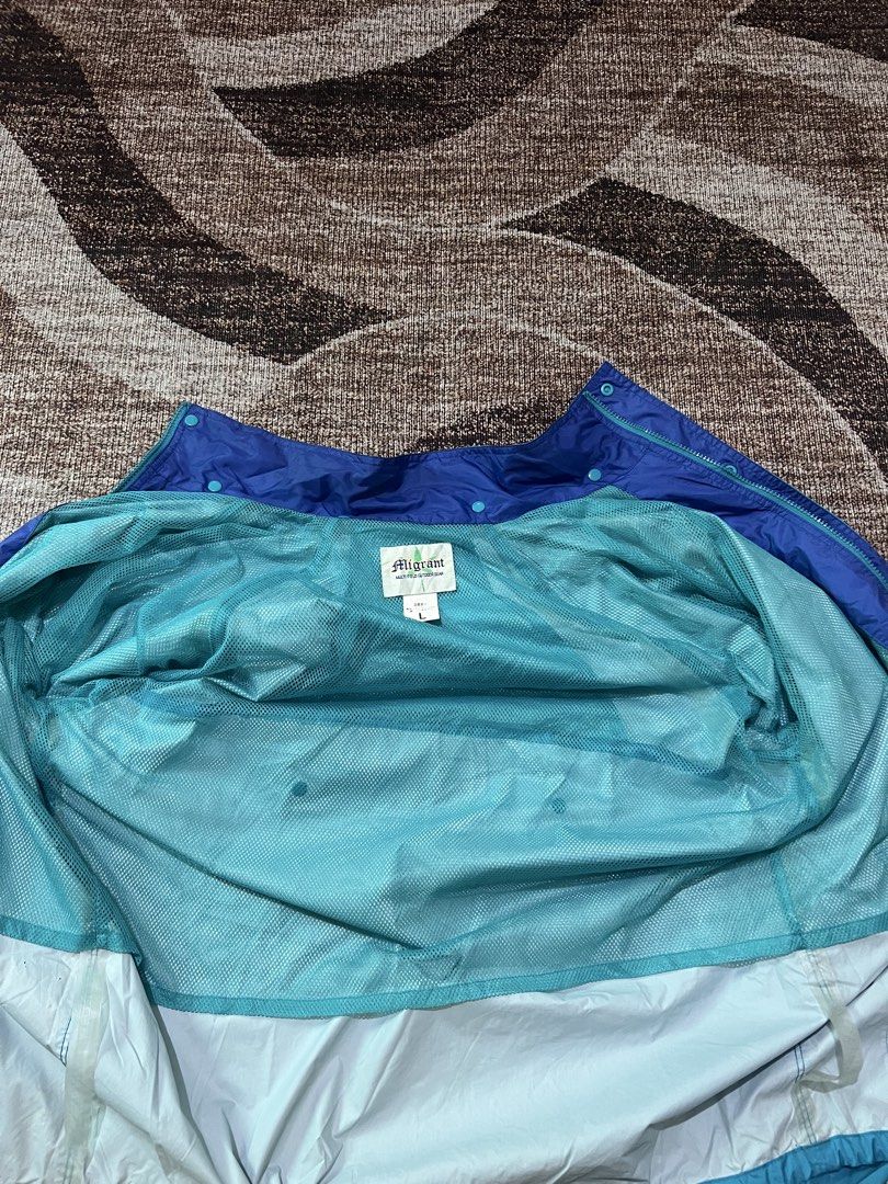 Migrant Outdoor Gear Windbreaker (Category: Coats, Jackets and Outerwear) located in Rizal. Submitted by ithriftph_ (Listing ID 1464582987, Image 3). Description: 🔻 Details 🔻 Migrant Outdoor Gear Windbreaker Mesh type inside Large on tag Width: 25" Length: 28" Color rate: 9/10 Condition: 9/10 No issue Price: 100 pesos Reminders: Color may vary due to lighting and your screen resolution. Note: Ready to wear (already washed) Mode of Payment: 📌 G