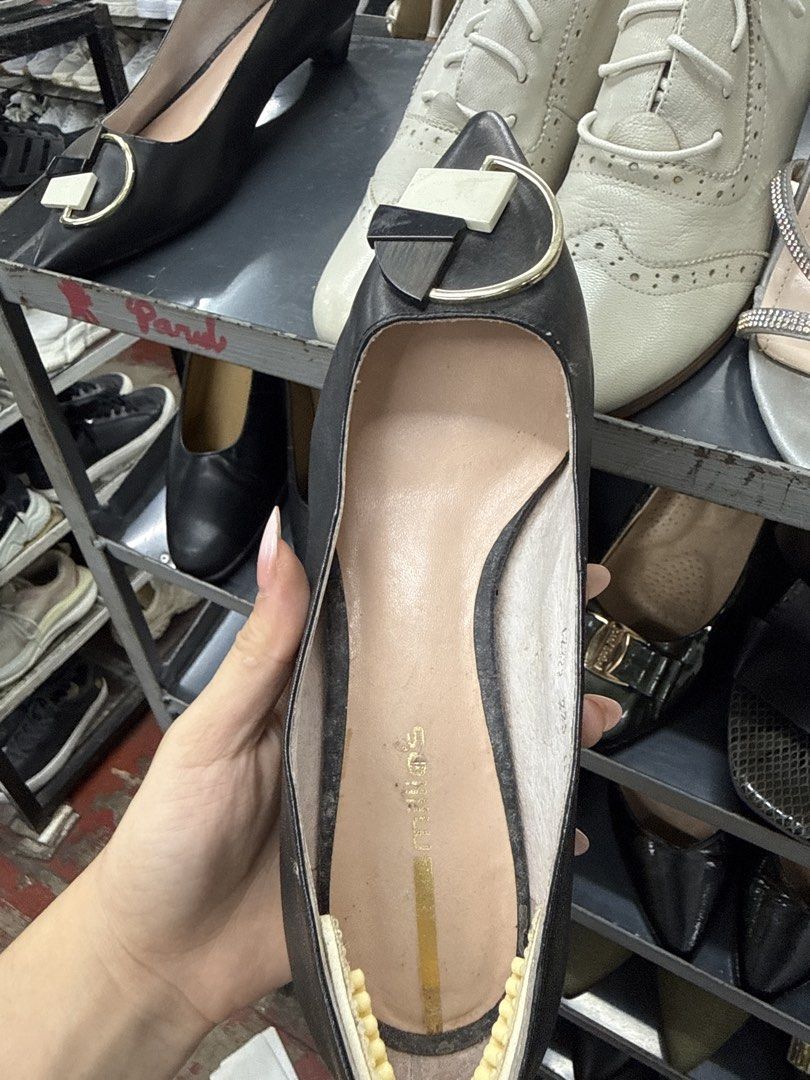 Millie's Black Pointed Toe Heels Size 225 (Category: Heels) located in Manila. Submitted by fastlion.584bdf (Listing ID 1464734390, Image 3). Description: - Brand/Model: Millie's Black Pointed Heels - Size: 225 (EU 35) - Design: Chunky statement buckle with gold and white contrast detailing - Heel: Low heel style, very comfortable and easy to walk in - Material: Leather lining inside with added extra grip sticker in the heel counter - Condition: 