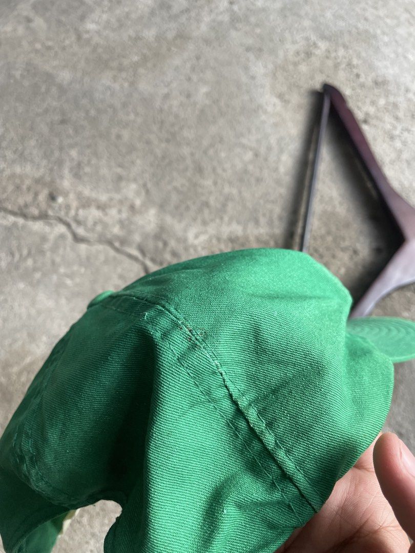 Milwaukee Bucks Green Embroidered Baseball Cap (Category: Caps & Hats) located in Polomolok. Submitted by madagascarts (Listing ID 1464674291, Image 3). Description: - Green baseball cap - Milwaukee Bucks embroidery with classic deer logo - Adjustable strap at the back for a comfortable fit - Perfect for any fan.