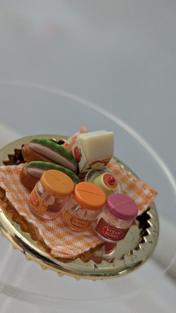 Miniature Food Toy Sets With Boxes And Jars (Category: Kids Toys) located in Quezon City. Submitted by furbous (Listing ID 1464717970, Image 2). Description: - Adorable tiny food miniature collection - Includes sweet boxes, mini jam jars, hot dogs, and a small milk carton - Comes with a cute orange checkered cloth display mat - Highly realistic details painted on jars and boxes - Perfect for dollhouses, dioramas, and miniature collectors.