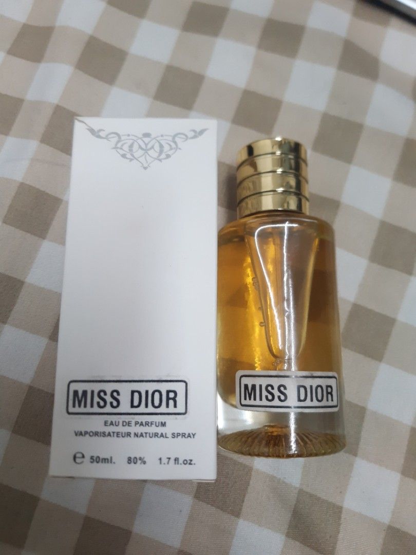 Miss Dior Eau de Parfum Natural Spray 50ml (Category: Fragrance & Deodorants) located in Manila. Submitted by loveyesha (Listing ID 1464591038, Image 1). Description: - Inspired Miss Dior Eau de Parfum - Size: 50ml - Oil based - Features: Elegant gold cap, beautiful golden perfume color - Ideal for: Everyday wear.