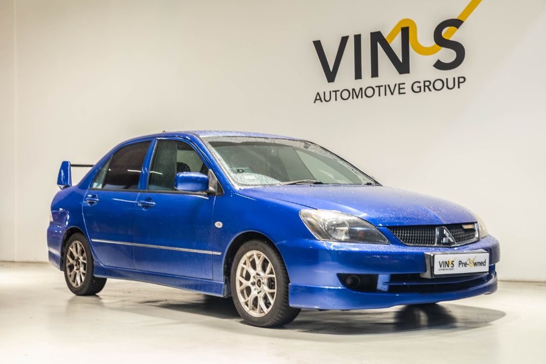 Mitsubishi Lancer 1.6M GLX (COE till 01/2029) Auto (Category: Used Cars) located in Singapore. Submitted by vinsautogroup (Listing ID 1464634788, Image 2). Description: Consignment Unit Vehicle Features: Powered by 1.6l 4 cylinder inline 16 valves SOHC, smooth 5 speed manual transmission, ABS, SRS airbags, knockdown rear seats. Accessories: Sard radiator, Front strut bar, d2 coilover, Cs5 original recaro semi bucket seat and restored, original cf