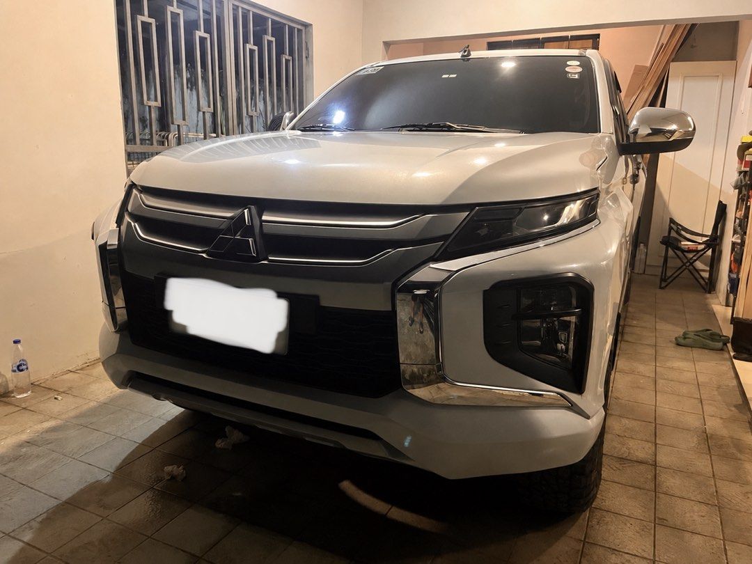 Mitsubishi Strada 2019 GLX Plus Auto (Category: Used Cars) located in Manila. Submitted by ejstrada2019 (Listing ID 1464586493, Image 1). Description: FOR SALE – 2019 Mitsubishi Strada GLX Plus 2.4 Automatic Price: ₱700,000 First Owner 2019 Mitsubishi Strada GLX Plus 2.4 AT in White Diamond with 110,000 KM mileage. Powered by a 2.4L MIVEC Turbo Diesel engine producing 181 PS and 430 Nm of torque, paired with a 6-speed automatic transmission. Casa