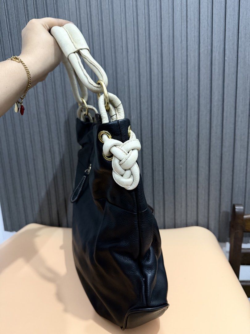 MIU MIU hobo shoulder bag (Category: Luxury Bags & Wallets) located in Cavite. Submitted by aiznpreluvv (Listing ID 1464721994, Image 3). Description: Detailed pics already pics Wag mghnap ng waley No issues .