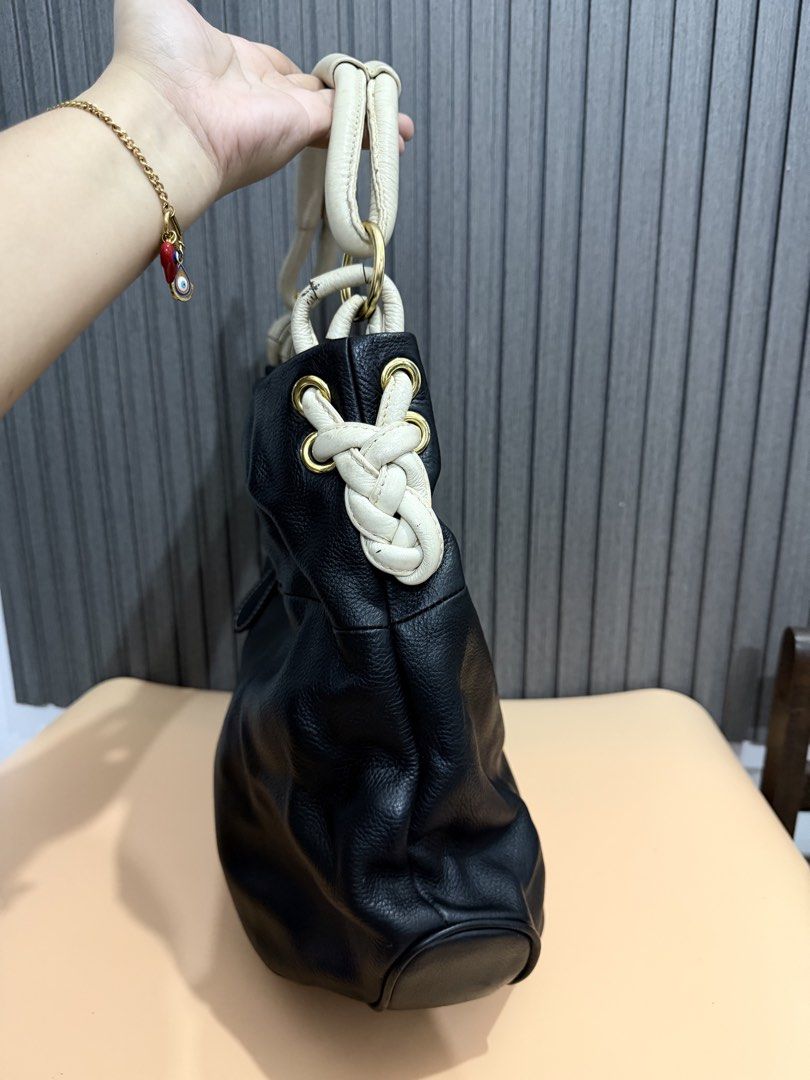 MIU MIU hobo shoulder bag (Category: Luxury Bags & Wallets) located in Cavite. Submitted by aiznpreluvv (Listing ID 1464721994, Image 2). Description: Detailed pics already pics Wag mghnap ng waley No issues .