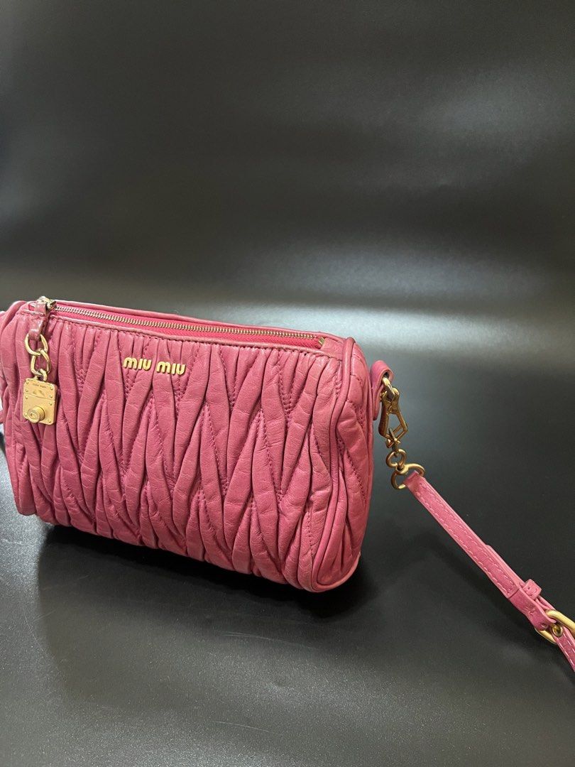 MIU MIU matelassé crossbody (Category: Luxury Bags & Wallets) located in Cebu City. Submitted by sexyclosetph2.0 (Listing ID 1464650247, Image 3). Description: In great condition Leather can be restored (with milk conditioner or any for the leather restoration) Still very gold hardwares Check all details posted Lampo underzip Clean inside and outside.