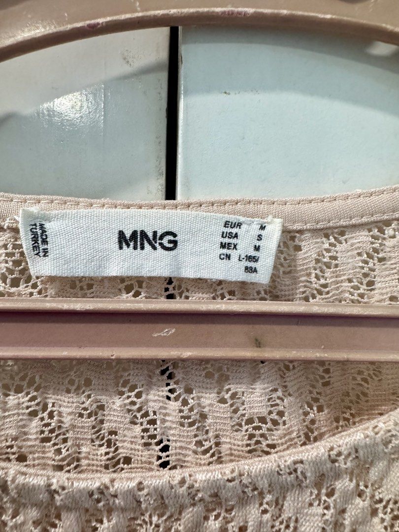 MNG Beige Crochet Long Sleeve Top (Category: Longsleeves) located in Manila. Submitted by melissaal82890 (Listing ID 1464587173, Image 3). Description: - Beige crochet top from MNG - Long sleeves with ruffled shoulder detail - Chevron pattern throughout - Perfect for layering or wearing solo - Ideal for casual or dressed-up occasions.